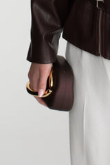 Clutch With Gold Sculptural Handle – Brown And Gold