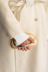 Clutch With Gold Sculptural Handle – Gold